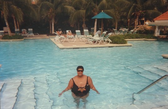 Kasey emerges from the pool at the  Sonesta